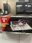 Skil 7-AMP Flooring Saw With 4 3/8" 36T Carbide Contractor Blade Model 3601-02 Open. Price: $150.00.