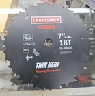 Craftsman 7-1/4 18T Inch Titanium Carbide-tipped Circular Saw Blade Open. Price: $30.00.